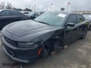 2018 Dodge Charger SXT with VIN 2C3CDXBG0JH206876, listed as a IAAI auction lot 41513172 with 91,674 mi miles. Bid and sale history available at carsss.com. Image 2.