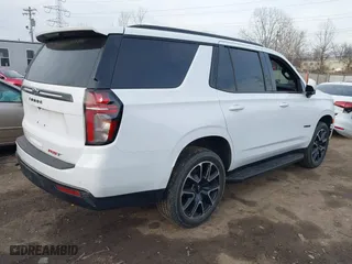 2021 Chevrolet Tahoe RST with VIN 1GNSKRKD8MR437213, listed as a IAAI auction lot 41827870 with 47,169 mi miles. Bid and sale history available at carsss.com. Image 4.