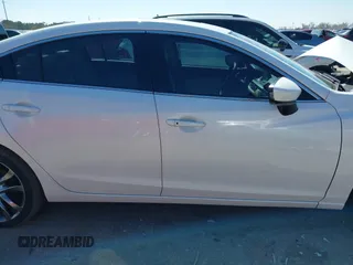 2016 Mazda 6 i Grand Touring with VIN JM1GJ1W57G1403028, listed as a IAAI auction lot 41591235 with 110,079 mi miles and . Bid and sale history available at carsss.com. Image 13.