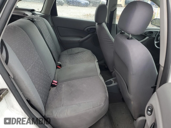 2004 Ford Focus with VIN 3FAFP37Z94R101447, listed as a Copart auction lot 74570054 with 162,166 mi miles and Salvage title. Bid and sale history available at DreamBid. Image 10.