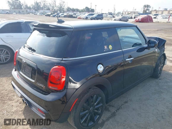 2016 MINI Hardtop S with VIN WMWXP7C58G3B49050, listed as a IAAI auction lot 42397484 with 103,083 mi miles and . Bid and sale history available at DreamBid. Image 4.