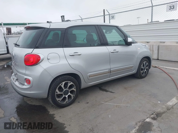 2014 FIAT 500L Lounge with VIN ZFBCFACH8EZ005035, listed as a IAAI auction lot 41824368 with 80,914 mi miles and . Bid and sale history available at DreamBid. Image 4.