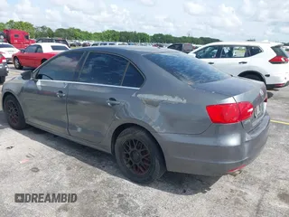 2013 Volkswagen Jetta SE with VIN 3VWDP7AJ1DM280251, listed as a IAAI auction lot 42391472 with 98,788 mi miles and . Bid and sale history available at DreamBid. Image 3.