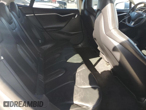 2013 Tesla Model S с VIN 5YJSA1DG7DFP11382, выставлен на аукционе Copart как лот 67097375 с пробегом 55 481 миль миль и Списание • Salvage title. История ставок и продаж доступна на DreamBid. Изображение 10.