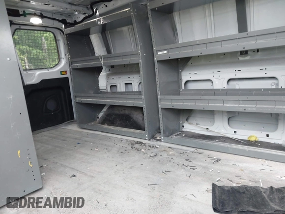2020 Ford Transit Cargo z VIN 1FTBR2Y80LKB22354, wystawiony jako IAAI lot #42347579 z przebiegiem 64 513 mil mil oraz . Historia ofert i sprzedaży dostępna na DreamBid. Obrazek 8.