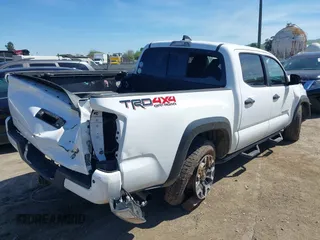 2022 Toyota Tacoma SR z VIN 3TMCZ5AN0NM499428, wystawiony jako IAAI lot #41874787 z przebiegiem Nie podano mil oraz . Historia ofert i sprzedaży dostępna na DreamBid. Obrazek 4.
