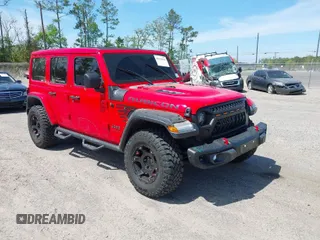 2020 Jeep Wrangler Unlimited Rubicon with VIN 1C4HJXFG9LW106607, listed as a IAAI auction lot 41908295 with 71,083 mi miles. Bid and sale history available at carsss.com. Image 1.