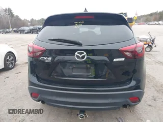 2016 Mazda CX-5 Grand Touring with VIN JM3KE4DY1G0685449, listed as a IAAI auction lot 41162840 with 134,525 mi miles. Bid and sale history available at carsss.com. Image 17.