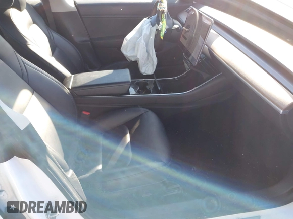 2019 Tesla Model 3 Long Range with VIN 5YJ3E1EBXKF452900, listed as a IAAI auction lot 41454947 with 93,277 mi miles. Bid and sale history available at carsss.com. Image 5.