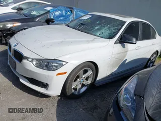 2013 BMW 3 Series 328i with VIN WBA3C1G55DNR47505, listed as a IAAI auction lot 42063459 with 96,494 mi miles. Bid and sale history available at carsss.com. Image 2.
