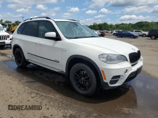 2012 BMW X5 35i with VIN 5UXZV4C54CL763857, listed as a Copart auction lot 57943195 with 143,522 mi miles and Salvage title. Bid and sale history available at DreamBid. Image 4.
