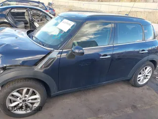 2013 MINI Countryman S with VIN WMWZC3C52DWP21475, listed as a IAAI auction lot 41215334 with 124,365 mi miles and . Bid and sale history available at DreamBid. Image 15.