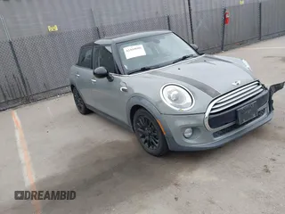 2015 MINI Hardtop 4 Door with VIN WMWXS5C53FT827458, listed as a IAAI auction lot 42444680 with 141,709 mi miles and . Bid and sale history available at DreamBid. Image 1.
