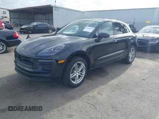 2023 Porsche Macan with VIN WP1AA2A58PLB16724, listed as a IAAI auction lot 41938233 with 19,660 mi miles. Bid and sale history available at carsss.com. Image 2.