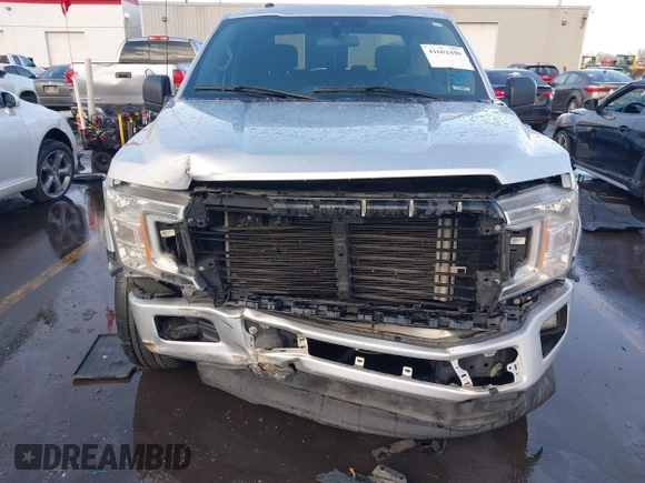 2019 Ford F-150 XL with VIN 1FTEW1C54KFD48711, listed as a IAAI auction lot 41601800 with 94,295 mi miles and . Bid and sale history available at carsss.com. Image 12.
