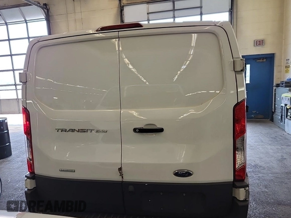 2018 Ford Transit with VIN 1FTYR1YG1JKB52228, listed as a IAAI auction lot 42832860 with 129,473 mi miles and . Bid and sale history available at DreamBid. Image 7.