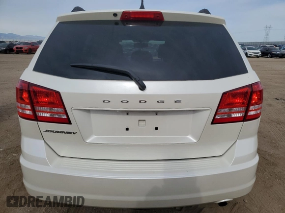2017 Dodge Journey SE with VIN 3C4PDCAB2HT675948, listed as a Copart auction lot 54778875 with 84,544 mi miles and Salvage Title. Bid and sale history available at DreamBid. Image 6.