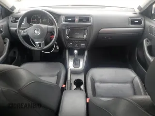 2014 Volkswagen Jetta TDI w/Premium/Nav z VIN 3VWLL7AJ1EM430822, wystawiony jako Copart lot #57405845 z przebiegiem 112 178 mil mil oraz Szkoda całkowita • Salvage title. Historia ofert i sprzedaży dostępna na DreamBid. Obrazek 8.