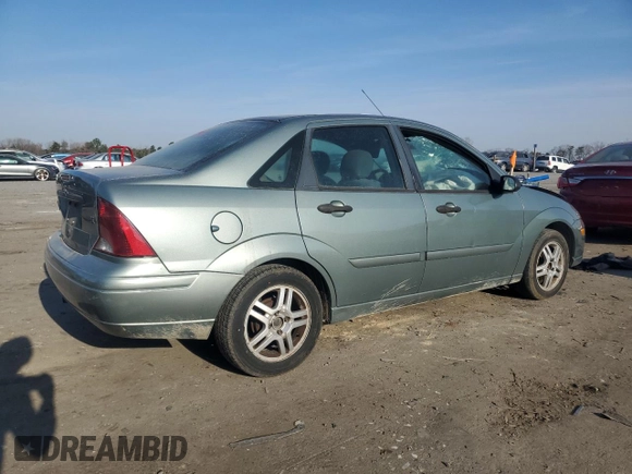2004 Ford Focus SE with VIN 1FAFP34314W127053, listed as a Copart auction lot 48652265 with 241,841 mi miles and Salvage title. Bid and sale history available at DreamBid. Image 3.