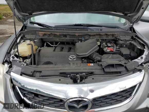 2011 Mazda CX-9 Touring with VIN JM3TB3CV7B0326839, listed as a Copart auction lot 57061345 with 111,832 mi miles and Salvage title. Bid and sale history available at DreamBid. Image 12.