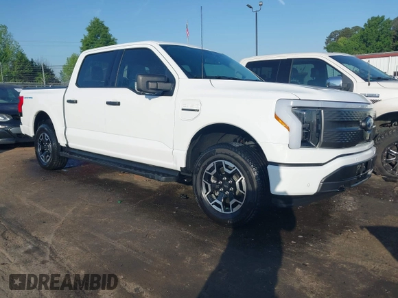 2023 Ford F-150 Lightning Pro with VIN 1FTVW1EL6PWG34059, listed as a IAAI auction lot 42010900 with 20,759 mi miles and . Bid and sale history available at DreamBid. Image 1.