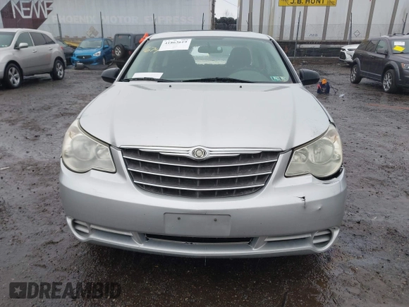 2010 Chrysler Sebring Touring z VIN 1C3CC4FB5AN128652, wystawiony jako IAAI lot #41863619 z przebiegiem 123 698 mil mil oraz . Historia ofert i sprzedaży dostępna na DreamBid. Obrazek 11.