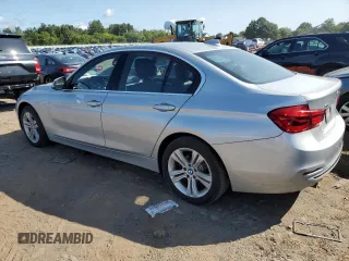 2018 BMW 3 Series with VIN WBA8F1C59JK898499, listed as a Copart auction lot 68247874 with 107,189 mi miles and Salvage title. Bid and sale history available at DreamBid. Image 2.