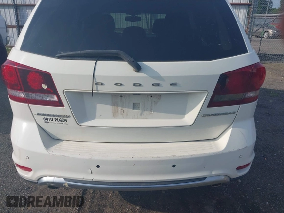 2015 Dodge Journey Crossroad with VIN 3C4PDCGG6FT588666, listed as a IAAI auction lot 42452044 with 238,566 mi miles and . Bid and sale history available at DreamBid. Image 14.