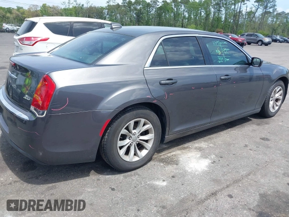 2015 Chrysler 300 Limited with VIN 2C3CCAAG1FH887073, listed as a IAAI auction lot 41967713 with 255,638 mi miles. Bid and sale history available at carsss.com. Image 4.