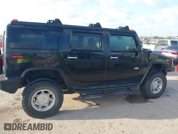 2006 Hummer H2 with VIN 5GRGN23U96H116719, listed as a IAAI auction lot 41781406 with 175,118 mi miles. Bid and sale history available at carsss.com. Image 13.