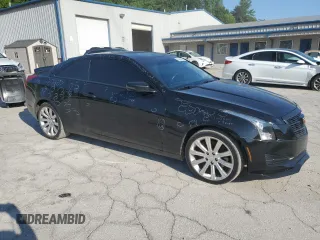 2015 Cadillac ATS Standard AWD z VIN 1G6AG1RX9F0141957, wystawiony jako Copart lot #59305055 z przebiegiem 72 244 mil mil oraz Szkoda całkowita • Salvage title. Historia ofert i sprzedaży dostępna na DreamBid. Obrazek 4.