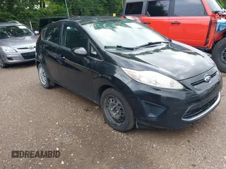 2012 Ford Fiesta SE z VIN 3FADP4EJ9CM153294, wystawiony jako IAAI lot #42461533 z przebiegiem 129 700 mil mil oraz . Historia ofert i sprzedaży dostępna na DreamBid. Obrazek 1.