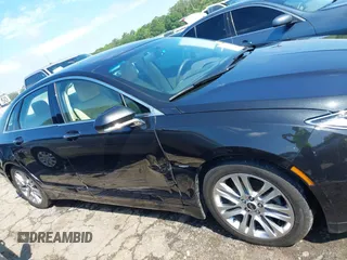 2014 Lincoln MKZ Hybrid with VIN 3LN6L2LU4ER811119, listed as a IAAI auction lot 42190415 with 98,898 mi miles and . Bid and sale history available at DreamBid. Image 13.