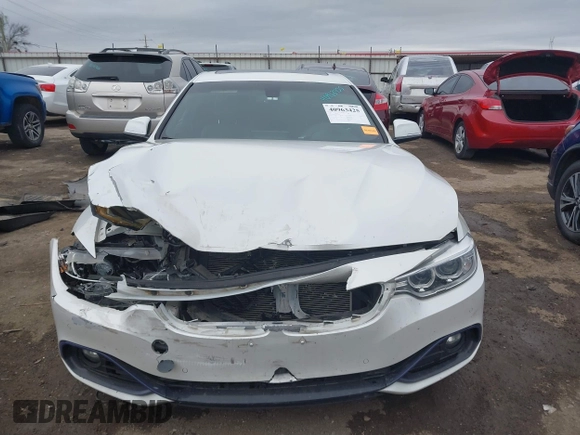 2016 BMW 4 Series 428i with VIN WBA3N7C54GK227475, listed as a IAAI auction lot 40963425 with 87,408 mi miles and . Bid and sale history available at carsss.com. Image 12.