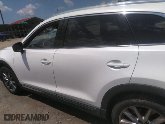 2017 Mazda CX-9 Signature with VIN JM3TCBEY2H0140598, listed as a IAAI auction lot 42561999 with 61,574 mi miles and . Bid and sale history available at DreamBid. Image 14.