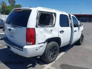 2007 Chevrolet Tahoe LT with VIN 1GNFC13027J407025, listed as a IAAI auction lot 42290155 with Not provided miles and . Bid and sale history available at DreamBid. Image 4.