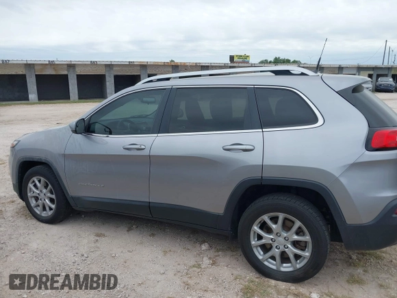 2018 Jeep Cherokee Latitude with VIN 1C4PJLCX4JD559096, listed as a IAAI auction lot 41925282 with 127,488 mi miles and . Bid and sale history available at DreamBid. Image 14.