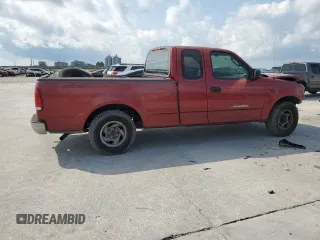 2004 Ford F-150 XL with VIN 2FTRX17W64CA79272, listed as a Copart auction lot 59186965 with 170,512 mi miles and Salvage title. Bid and sale history available at DreamBid. Image 3.