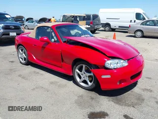 2001 Mazda MX-5 Miata with VIN JM1NB353210204983, listed as a IAAI auction lot 42555329 with 101,306 mi miles and . Bid and sale history available at DreamBid. Image 1.