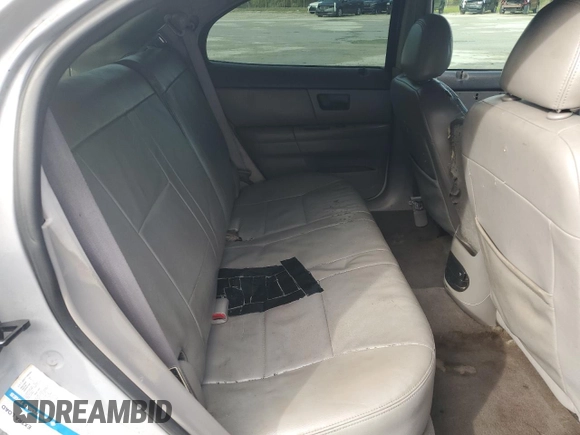 2003 Ford Taurus z VIN 1FAHP59U73A217826, wystawiony jako Copart lot #80059964 z przebiegiem 315 560 mil mil oraz Szkody całkowita. Historia ofert i sprzedaży dostępna na DreamBid. Obrazek 10.