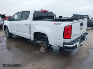 2019 Chevrolet Colorado 4WD Z71 with VIN 1GCGTDEN3K1317883, listed as a IAAI auction lot 41439010 with 34,306 mi miles. Bid and sale history available at carsss.com. Image 3.