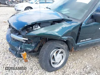 2003 Chevrolet Blazer LS z VIN 1GNDT13X93K177170, wystawiony jako IAAI lot #41839837 z przebiegiem 148 555 mil mil oraz . Historia ofert i sprzedaży dostępna na DreamBid. Obrazek 13.