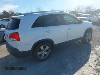 2013 Kia Sorento EX with VIN 5XYKU4A24DG395420, listed as a IAAI auction lot 41424732 with 154,661 mi miles and . Bid and sale history available at carsss.com. Image 4.