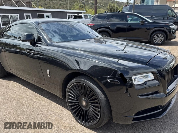2019 Rolls-Royce Wraith z VIN SCA665C54KUX87311, wystawiony jako Copart lot #52000635 z przebiegiem 14 875 mil mil oraz Tytuł czysty. Historia ofert i sprzedaży dostępna na DreamBid. Obrazek 1.