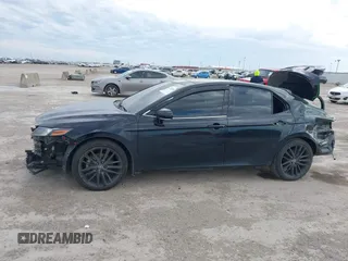 2022 Toyota Camry XSE z VIN 4T1K61AK2NU700840, wystawiony jako IAAI lot #41352884 z przebiegiem 98 634 mil mil oraz . Historia ofert i sprzedaży dostępna na DreamBid. Obrazek 6.