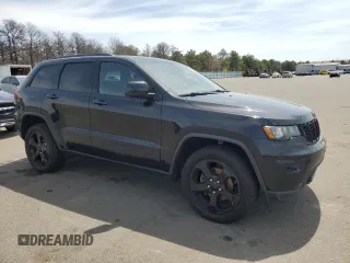 2018 Jeep Grand Cherokee Laredo E with VIN 1C4RJFAG5JC487392, listed as a Copart auction lot 54306125 with 183,666 mi miles and Clean Title. Bid and sale history available at carsss.com. Image 4.