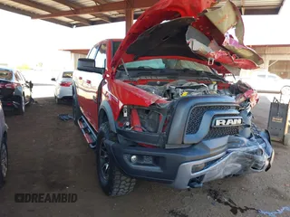 2016 Ram 1500 Rebel z VIN 1C6RR7YT3GS175255, wystawiony jako IAAI lot #42085582 z przebiegiem 67 971 mil mil oraz . Historia ofert i sprzedaży dostępna na DreamBid. Obrazek 1.
