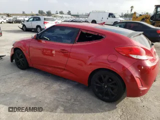 2016 Hyundai Veloster with VIN KMHTC6AD5GU277525, listed as a Copart auction lot 66564993 with 141,248 mi miles. Bid and sale history available at carsss.com. Image 2.