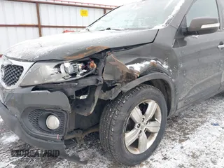 2012 Kia Sorento EX with VIN 5XYKUDA2XCG200628, listed as a IAAI auction lot 41495625 with 207,229 mi miles. Bid and sale history available at carsss.com. Image 6.