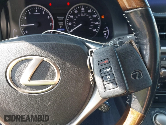 2015 Lexus ES 330 with VIN JTHBK1GG2F2179200, listed as a IAAI auction lot 42035802 with 149,275 mi miles and . Bid and sale history available at DreamBid. Image 11.